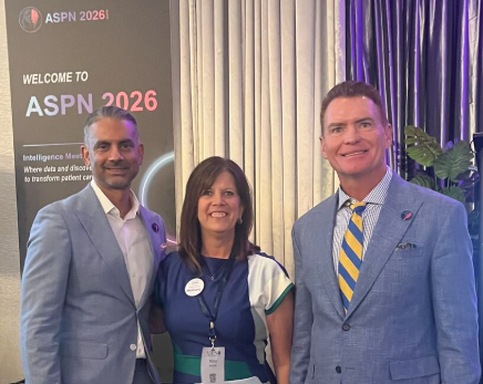 SPR CEO Maria Bennett (center) poses with ASPN founders Tim Deer (R) and Dawood Sayed (L).
